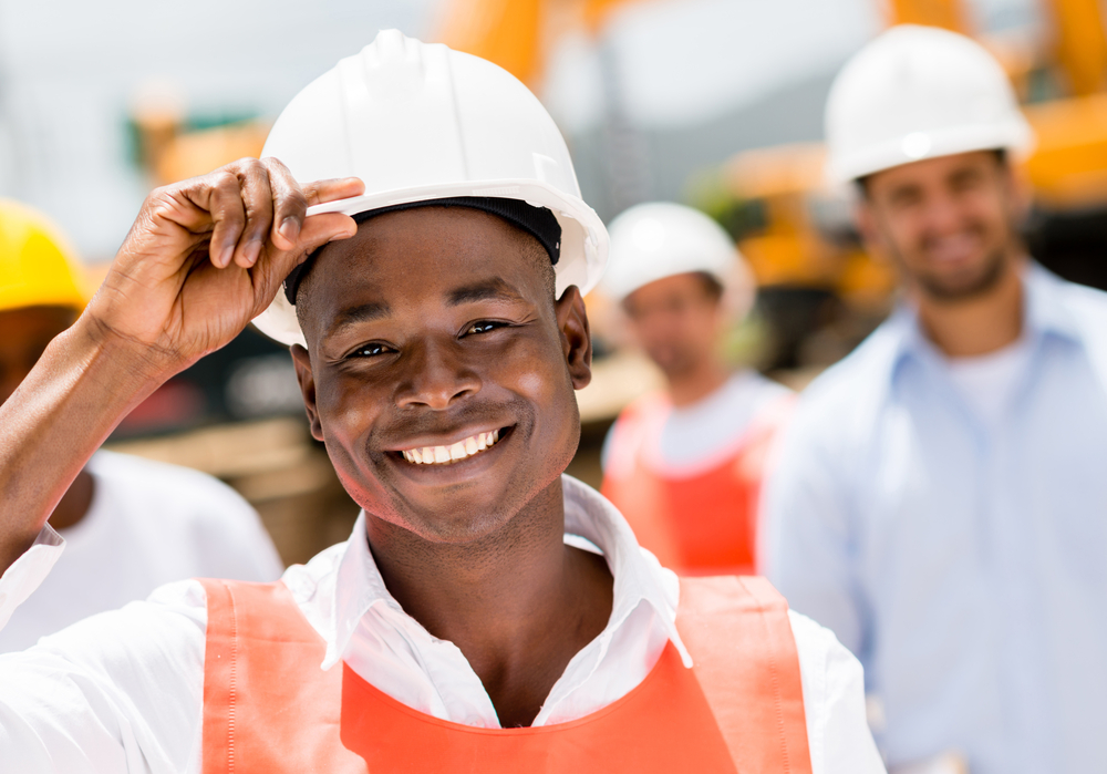 construction worker collaborating with team